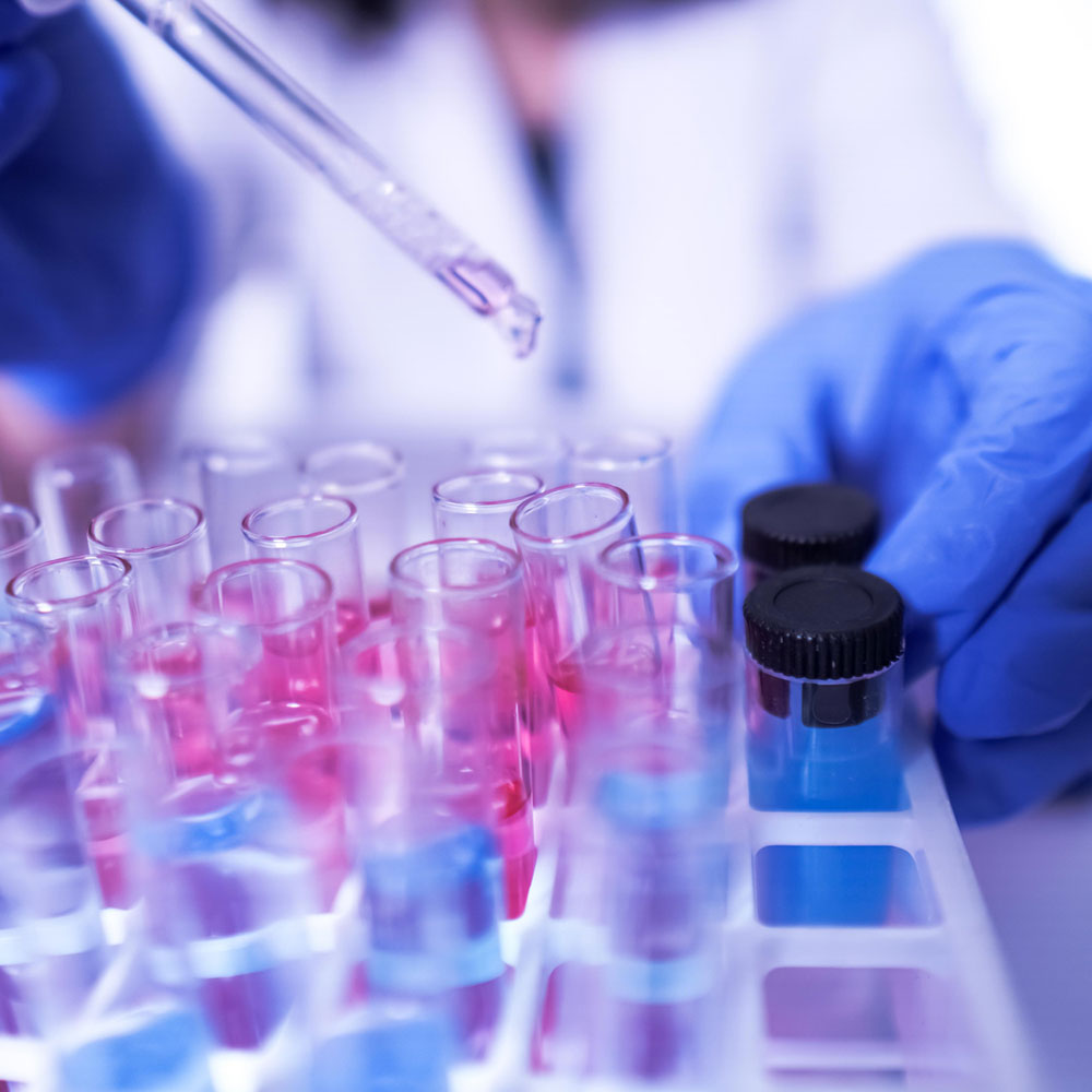 Scientist working with samples in test tubes